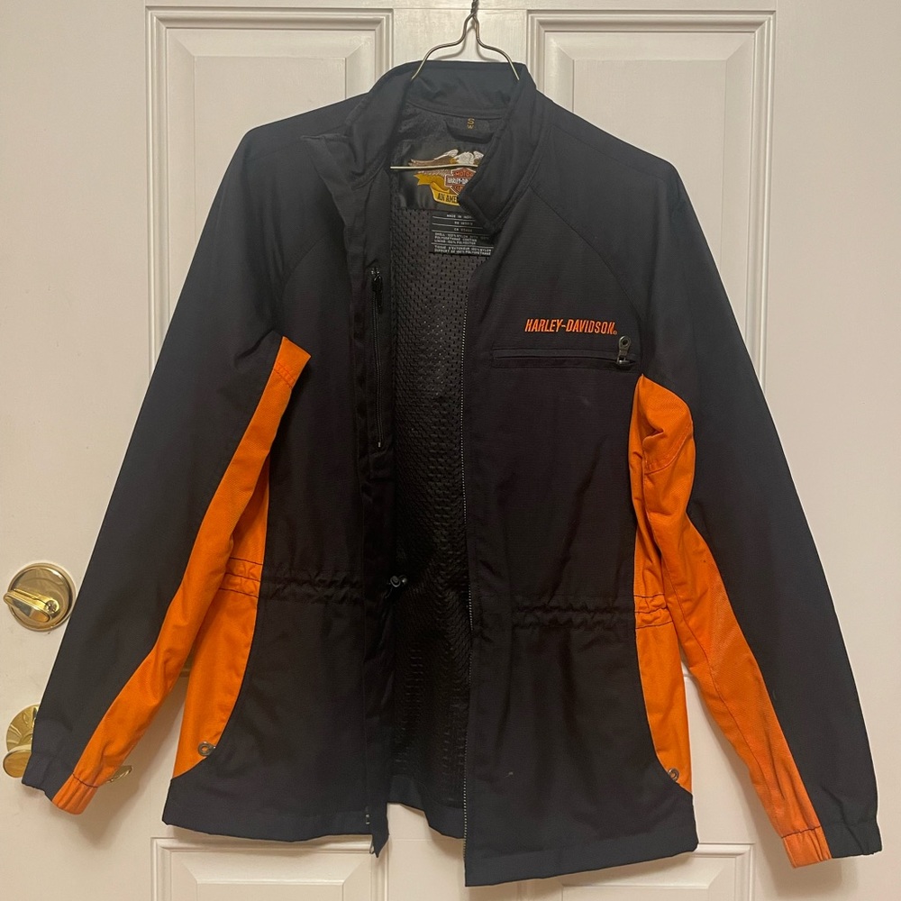 Harley-Davidson brand biker jacket. Black and Orange. Size S in womens.